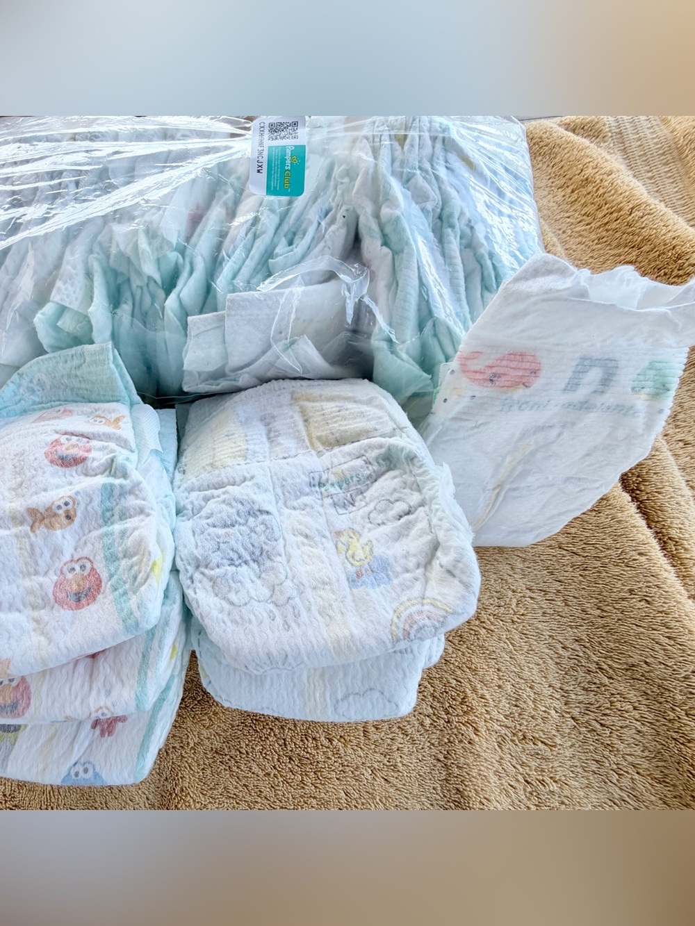 Lot of 44 Newborn Pampers Brand sesame Street & more unisex Baby or Doll Diapers